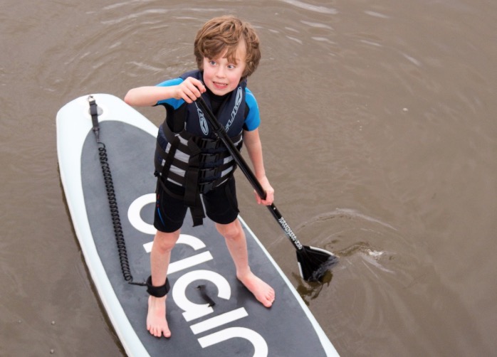 Asher Jenkin-Jones doing a SUP (Stand-up Paddle board) challenge to raise money for Brain Tumour Research, RNLI and RNIB. Photos by Alex WIlkinson, www.alexwilkinsonphotography.co.uk