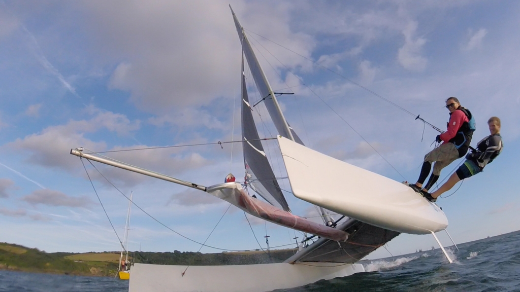 Who needs waves?!… Will goes SUP foiling behind a sailing cat!